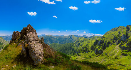 Panoramic view of a valley from a mountain peak