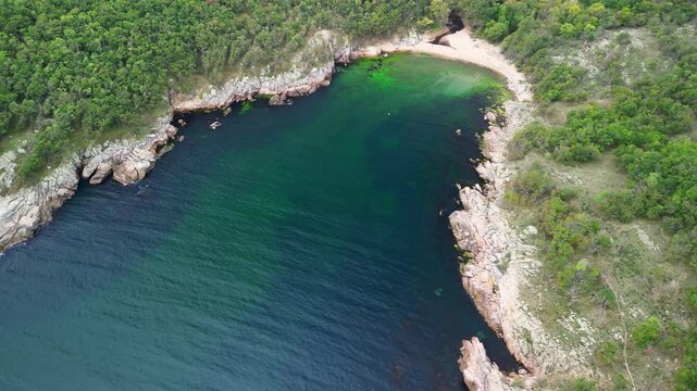 Aerial view over a small bay with a wild beach, located in the forest, Paraskeva Bay, Bulgaria