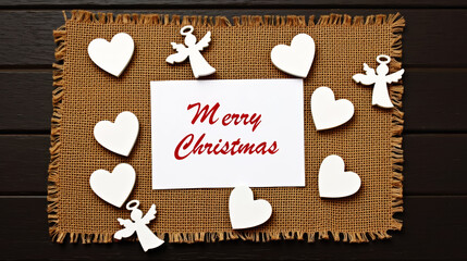 Christmas greeting card with hearts and angels on jute fabric