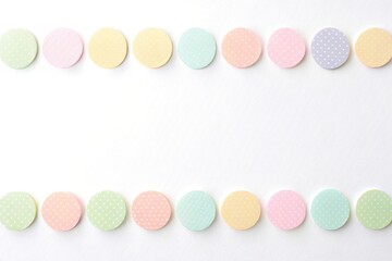 Pastel colored paper cutouts on white background