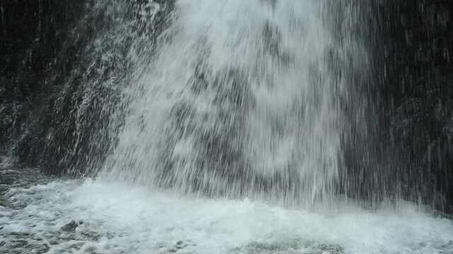 Closeup of a waterfall falling into a pond, slow motion, Josefsthaler Wasserf&auml;lle