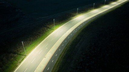 empty road in the night with modern LED street lights
