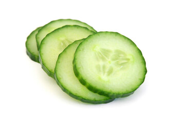 Cucumber and slices isolated over white background.