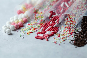 Collection of five types of confectionary bright sprinkes for birthday or Easter decoration