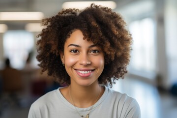 Fototapeta premium Portrait of a smiling female high school student