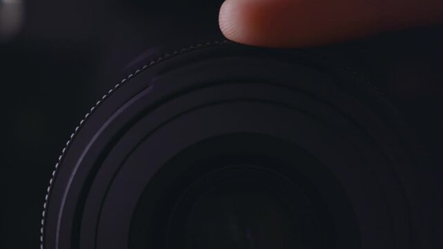 Turning focus wheel on camera lens