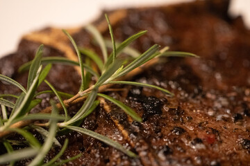 Rosemary Sprig on a Steak