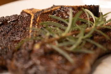 Rosemary Sprig on a Steak