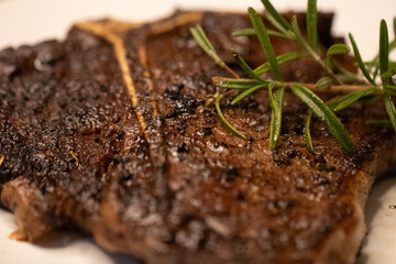 Rosemary Sprig on a Steak