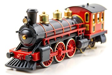 Obraz premium Plastic toy steam locomotive on a white background with selective focus