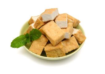 Fried tofu on a white background