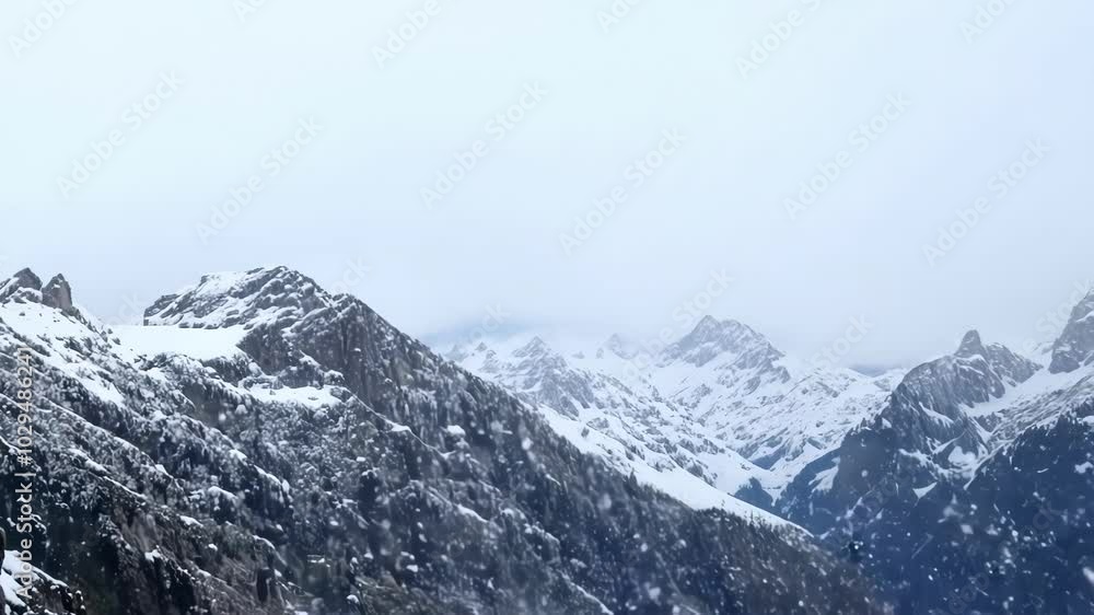 Poster snow covered mountains with evergreen trees under a cloudy sky, creating a scenic winter landscape p