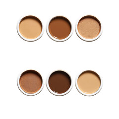 Four shades of face foundation displayed in circular makeup containers isolated on transparent background (4)
