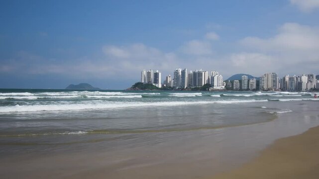 Beautiful morning at Pitangueiras beach. Beach on downtown of Guaruja, SP, Brazil.