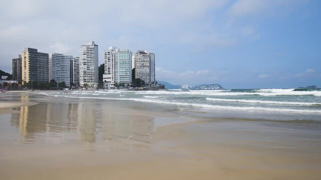 Beautiful morning at Pitangueiras beach. Beach on downtown of Guaruja, SP, Brazil.