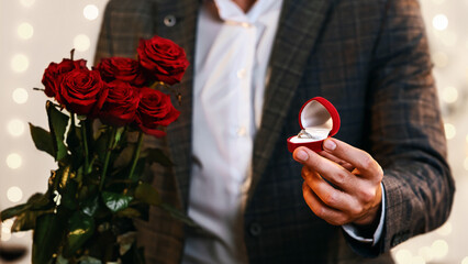Valentine's Day Proposal. Romantic Man With Engagement Ring And Roses Flowers Asking Girlfriend To...
