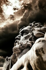 Fototapeta premium Dramatic close-up of a stone statue against dark, ominous clouds, ideal for art and architecture themes.