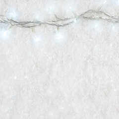 Winter background composition with decorative snow and New Year lights. Minimal Christmas or New Year concept.