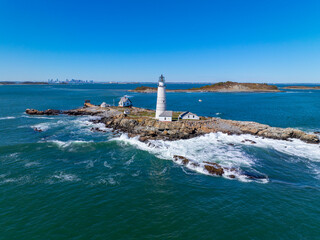 Boston Lighthouse on Little Brewster Island in Boston Harbor, Boston, Massachusetts MA, USA.