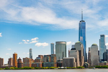 Fototapeta premium A view of the New York financial district fom Paulus Hook Pier in Jersey City, New Jersey.New York, United States. Manhattan New York NY NYC Skyline. Lower Manhattan and One World Trade Center in New