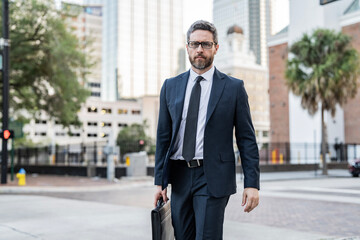 Walk to success. Hispanic businessman walk in the city. Business man crossing the street. Walk of business man. Businessman in New York. Business success. Businessman in suit walk outdoor