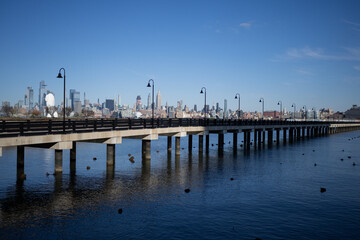 Fototapeta premium New York City Skyline with Urban Skyscrapers USA. New York City skyline, cityscape of Manhattan in USA. Panoramic view on Manhattan.