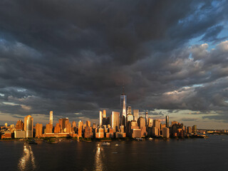 NYC aerial view, New York City Skyline with dramatic sky. Panoramic drone view on Manhattan in NY.