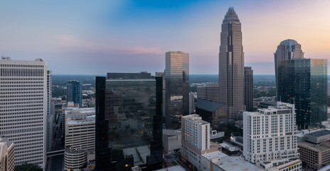Fototapeta premium Downtown Charlotte city skyline of skyscrapers at sunrise, Charlotte, North Carolina, United States.