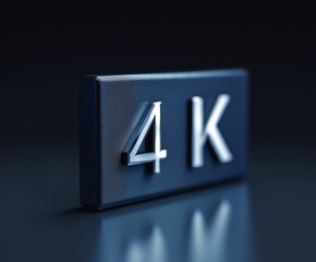 A sleek metallic 4K icon against a dark background, representing high-definition display quality and cutting-edge technology in media and entertainment.