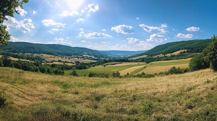 Fototapeta premium Serene Sunny Landscape with Rolling Hills and Fields