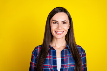 Fototapeta premium Photo portrait of attractive young woman toothy smile look camera dressed stylish plaid clothes isolated on yellow color background