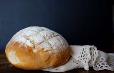 Side view of fresh from the oven bread ,isolated on black background.