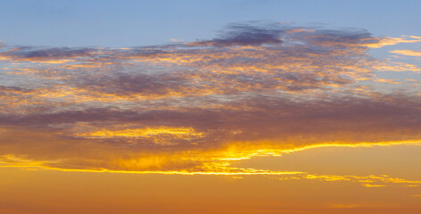Fototapeta premium Amazing evening skyscape. Sunset sky with bright colorful clouds