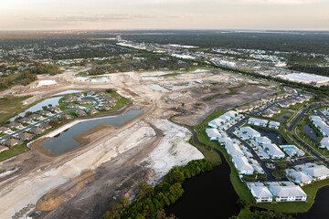 Development of residential housing in US suburbs. Beginning of construction works on prepared...