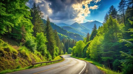 Naklejka premium Mountain road winding through lush forest under a blue sky, mountain, road, hill, sky, forest, curves, nature, landscape