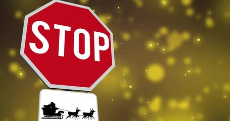 Animation of santa in sleigh and stop road sign over yellow spots - Powered by Adobe