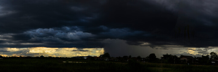Banner Dramatic dark storm clouds black sky background. Dark thunderstorm clouds rainny season. Panorama Meteorology danger windstorm disasters climate. Dark cloudscape storm cloud with copy space.