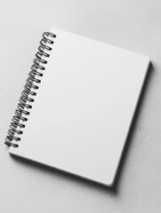 Spiral-Bound Notebook on Minimalist Surface
