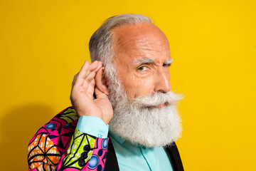 Photo portrait of nice senior male serious listen secret wear trendy colorful pink fancy outfit...