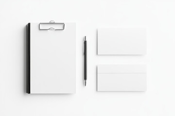 Minimalist stationery set featuring clipboard, blank business cards, and pen on clean white background. This arrangement is perfect for branding or design concepts