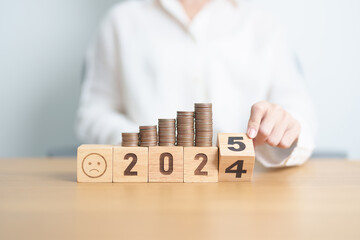 2024 end year to Happy New Year 2025 with Coins stack and Sad icon. goal, Money, Budget, investment, financial, savings, New Year Resolution, Satisfaction, feedback, Review and bad year concept