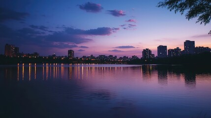 Fototapeta premium Serene City Skyline Reflected in Calm River Water