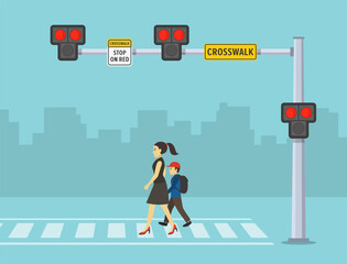 Pedestrian safety. Traffic regulation rules and tips. Female character holds kid's hand while crosses the street on hawk crosswalk. Flat vector illustration template. © flatvectors