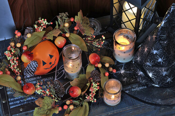 Happy Halloween. Holiday composition with pumpkins and candles. Background for design. 