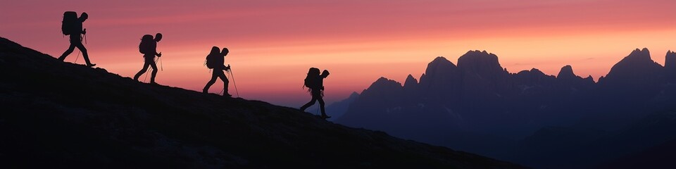 Fototapeta premium people climbing the mountines carrying climbing equipment and backpacks on their backs, concept of tourism, outdoor activities, hiking