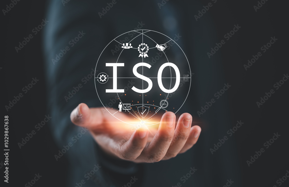 Poster iso standards and quality assurance concept. businessman presenting globe with various iso icons sym