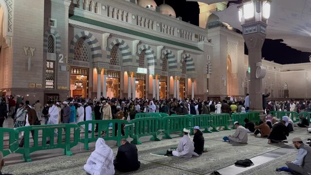 Medina, Kingdom of Saudi Arabia - 26.01.2024: Morning view of the Prophet's Mosque, an-Nabawi masjid. Prayers going out after pray.
