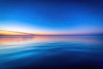 Obraz premium Serenity of ionosphere at twilight with blue and pink gradations over ocean horizon