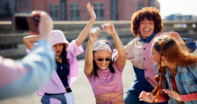 Women, friends and happy on smartphone with live streaming for fun, support and bonding. People, outdoor and excited or smile in city with fashion, style and swag as gen z for social media post