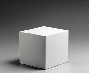 A white box sits on a grey surface